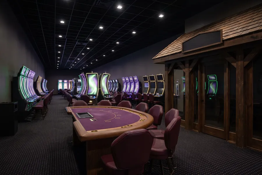Purple table and slot rows at Northern Lights Casino